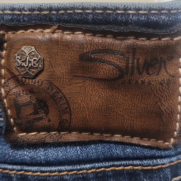 Med-dark wash Silver Jeans Suki 17" 34/34 - Picture 3 of 6